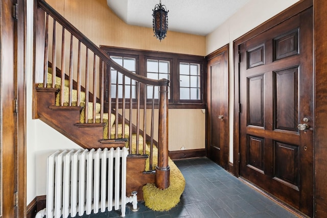 entrance foyer with radiator heating unit