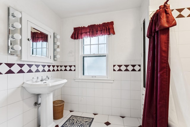 bathroom featuring tile walls and tile patterned floors