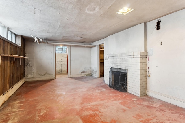 basement with a fireplace