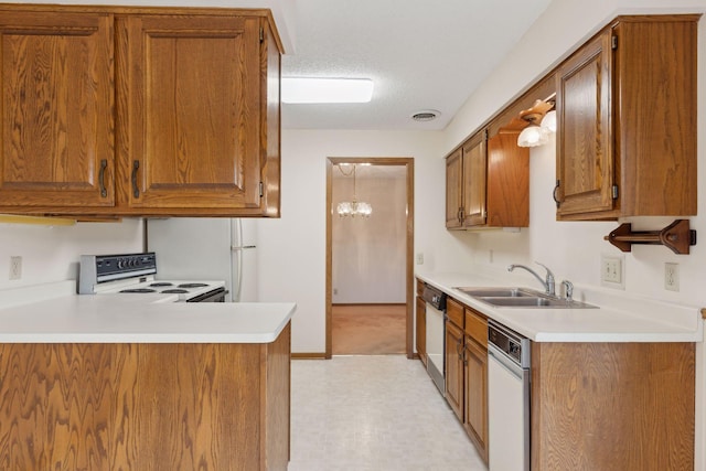 kitchen with a notable chandelier, sink, white electric stove, a textured ceiling, and dishwashing machine