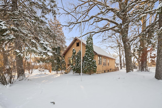 view of snow covered property