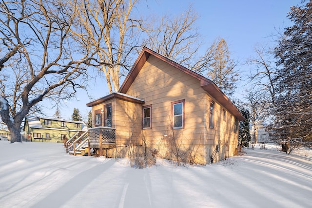 view of snow covered property