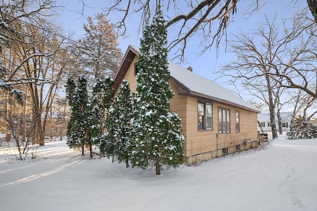 view of snow covered property