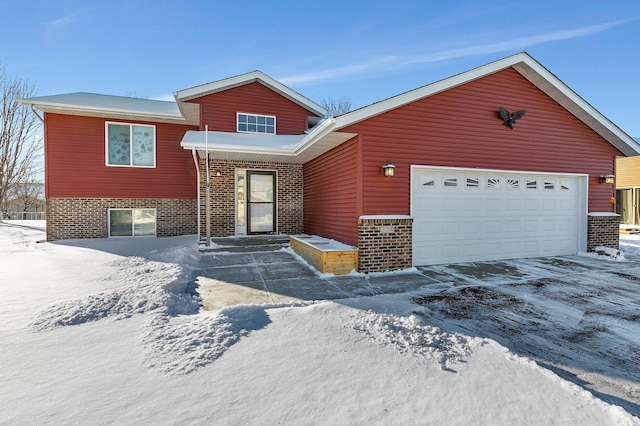 view of front of property featuring a garage