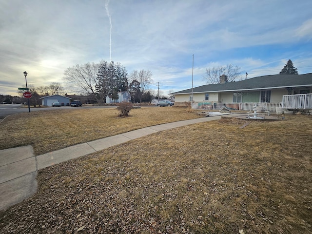 436 6th Ave SW, Cambridge, MN 55008 - view of yard featuring a porch