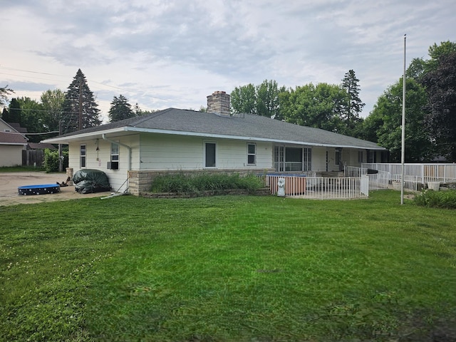 436 6th Ave SW, Cambridge, MN 55008 - back of house featuring a chimney