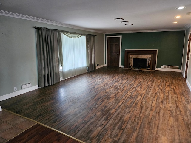 436 6th Ave SW, Cambridge, MN 55008 - unfurnished living room with crown molding, wood finished floors, and a high end fireplace
