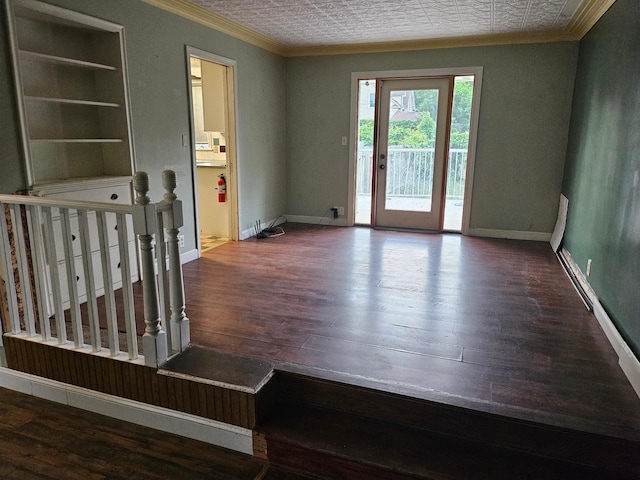 436 6th Ave SW, Cambridge, MN 55008 - unfurnished living room featuring ornamental molding, wood finished floors, built in features, and an ornate ceiling