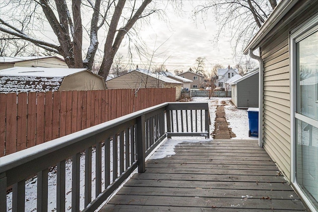 view of snow covered deck