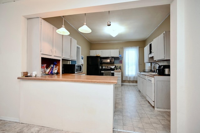 kitchen featuring black appliances, kitchen peninsula, sink, and hanging light fixtures