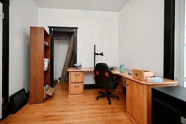 home office featuring light hardwood / wood-style flooring