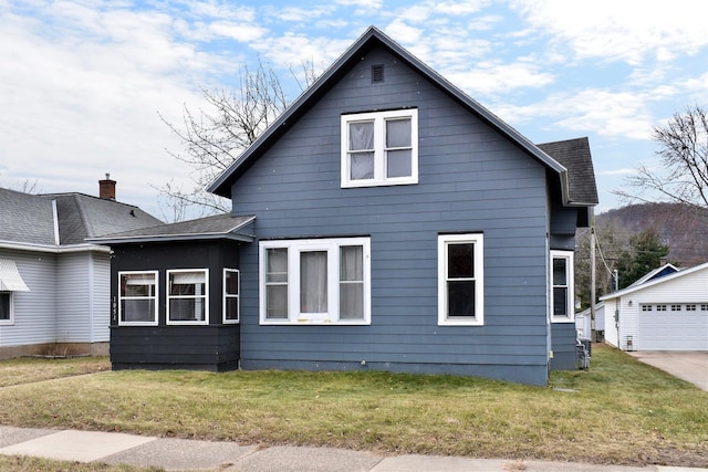 view of property exterior featuring a lawn