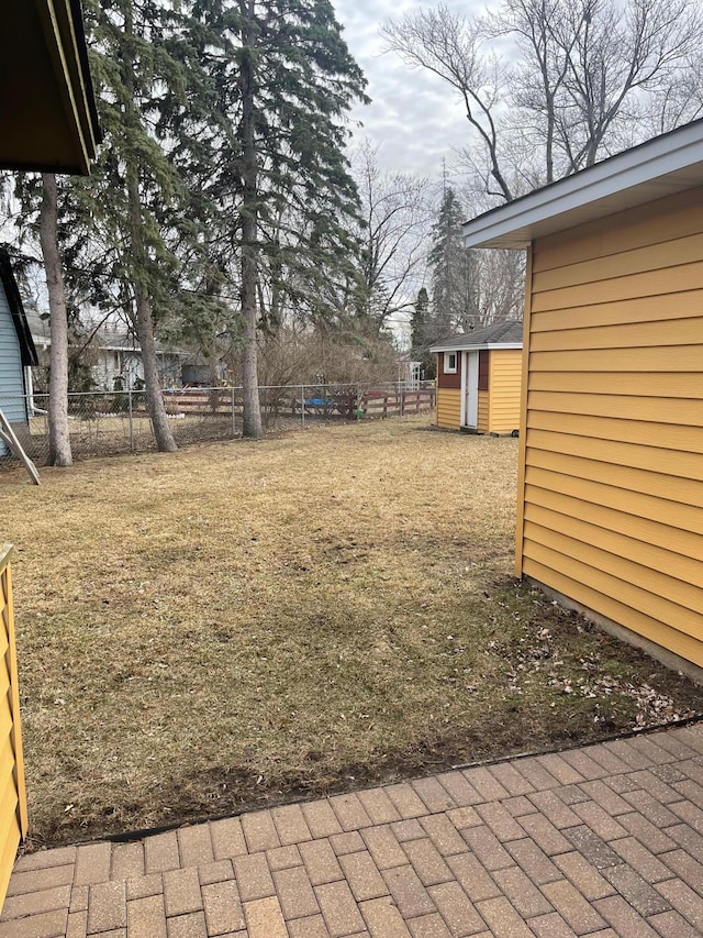 view of yard with a storage shed