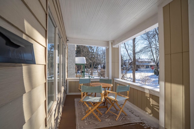 sunroom with plenty of natural light