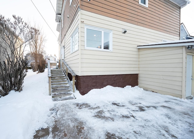 view of snow covered property