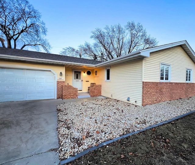 single story home with a garage