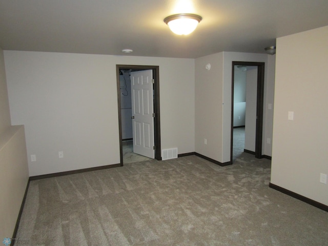 4433 19th St S, Moorhead, MN 56560 - spare room featuring carpet floors and baseboards