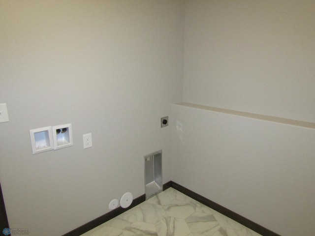 4433 19th St S, Moorhead, MN 56560 - washroom featuring electric dryer hookup and marble look tiles