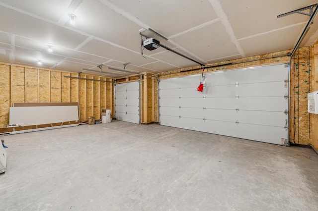 230 Eagle Ridge Dr, Roberts, WI 54023 - garage featuring a garage door opener
