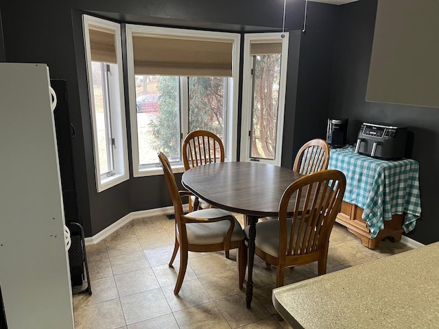 view of tiled dining space