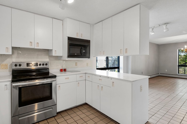 kitchen with white cabinets, black microwave, and stainless steel range with electric stovetop