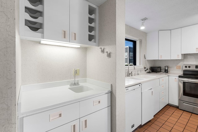 kitchen featuring electric stove, white cabinets, sink, and white dishwasher