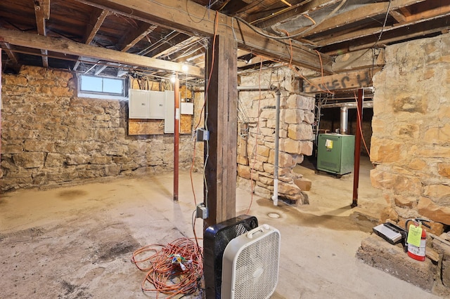 basement featuring electric panel