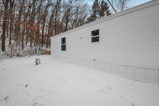 view of snow covered property