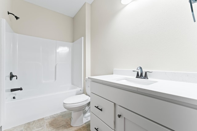 full bathroom featuring shower / bath combination, vanity, and toilet