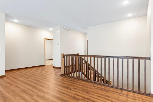 empty room featuring hardwood / wood-style floors