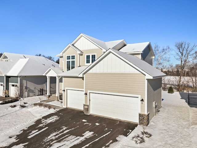 view of front of property featuring a garage