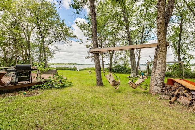 view of yard featuring a wooden deck