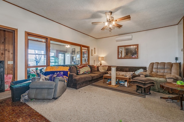 living room featuring a wall mounted AC, ceiling fan, and a textured ceiling