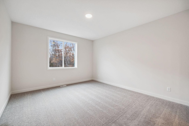 view of carpeted spare room