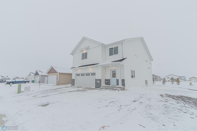 view of front of property featuring a garage