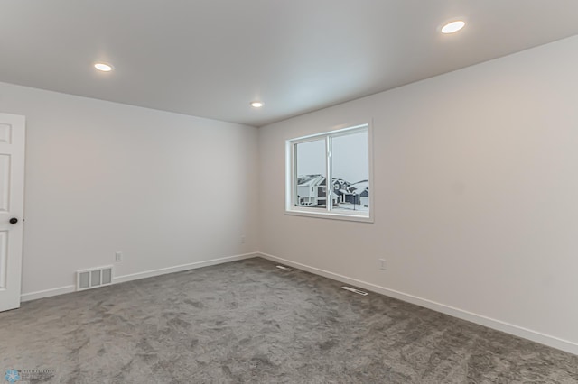 view of carpeted spare room