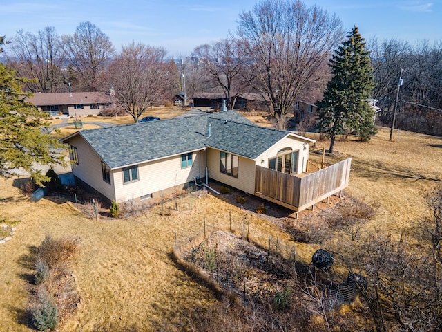 back of house featuring crawl space, a wooden deck, and a shingled roof