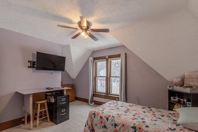 bedroom with light carpet, a textured ceiling, vaulted ceiling, and ceiling fan