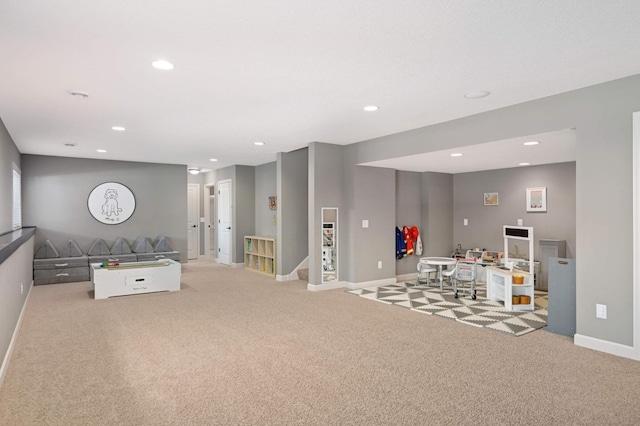 playroom featuring light carpet