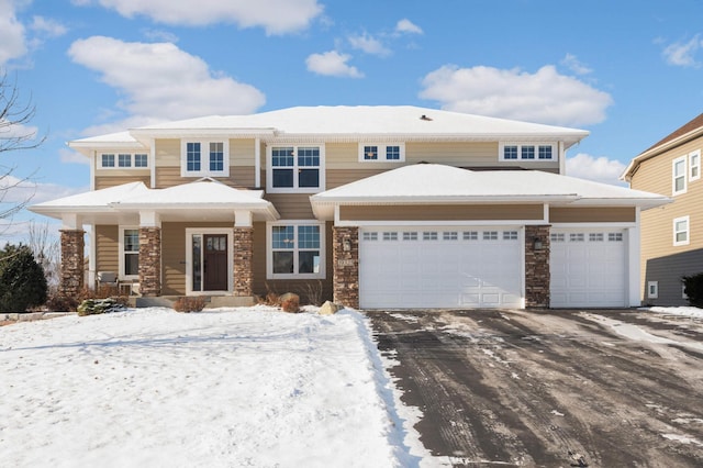 view of front of home with a garage and covered porch