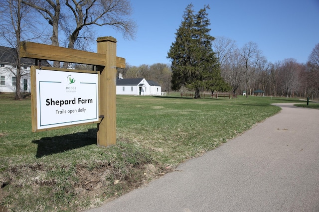 view of community featuring a yard