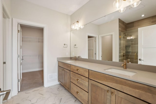 bathroom featuring vanity and walk in shower