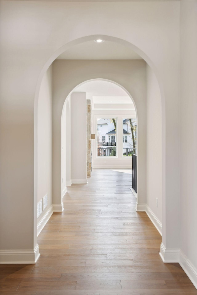 hallway featuring light hardwood / wood-style floors