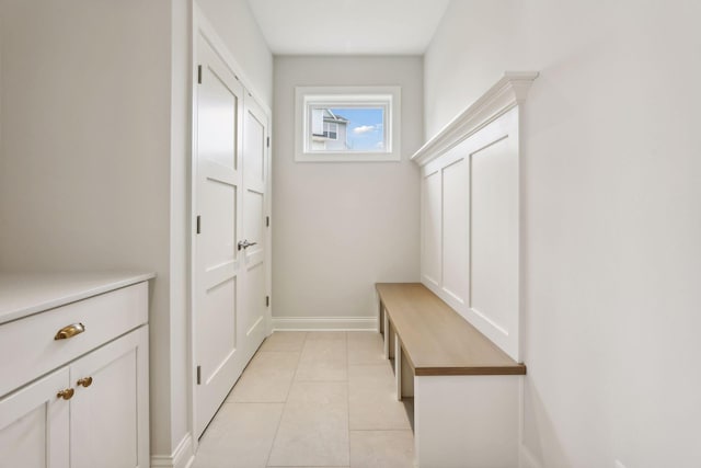 mudroom featuring light tile patterned floors