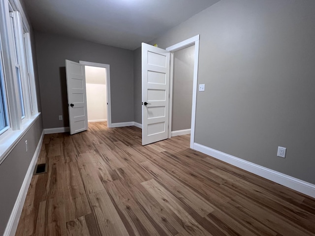 spare room featuring light wood-type flooring