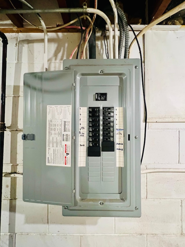 utility room featuring electric panel