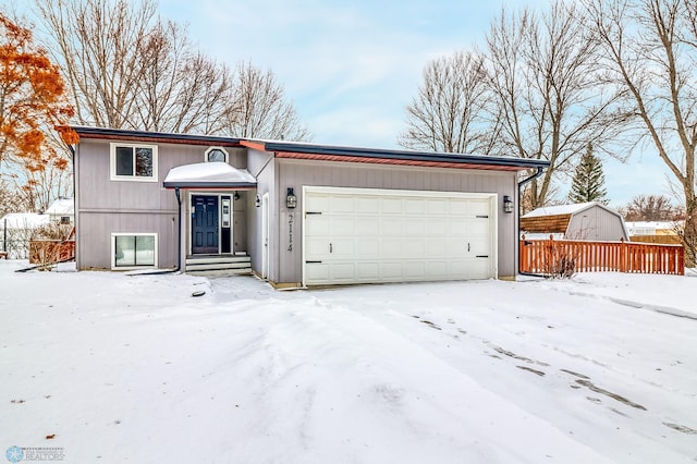 view of front of property featuring a garage