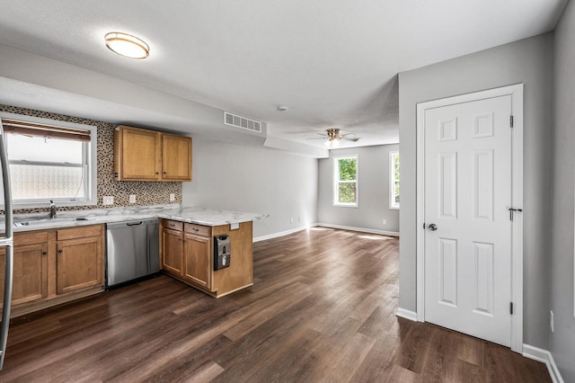 1415 Galtier St, Saint Paul, MN 55117 - kitchen with dishwasher, a peninsula, a sink, dark wood-style floors, and open floor plan