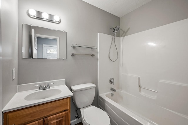 1415 Galtier St, Saint Paul, MN 55117 - bathroom featuring toilet,  shower combination, vanity, and a textured ceiling