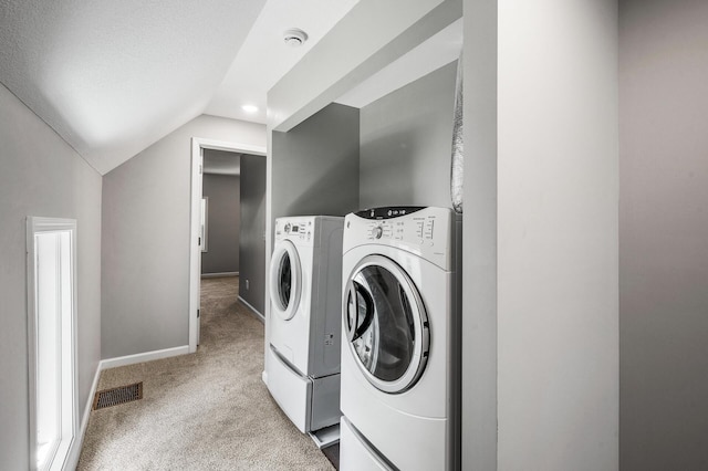 1415 Galtier St, Saint Paul, MN 55117 - laundry room featuring washer and clothes dryer, carpet floors, and baseboards